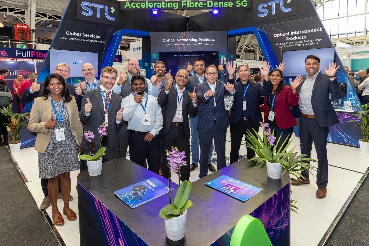 The STL team at their trade show booth, captured by an event videographer from Medialook