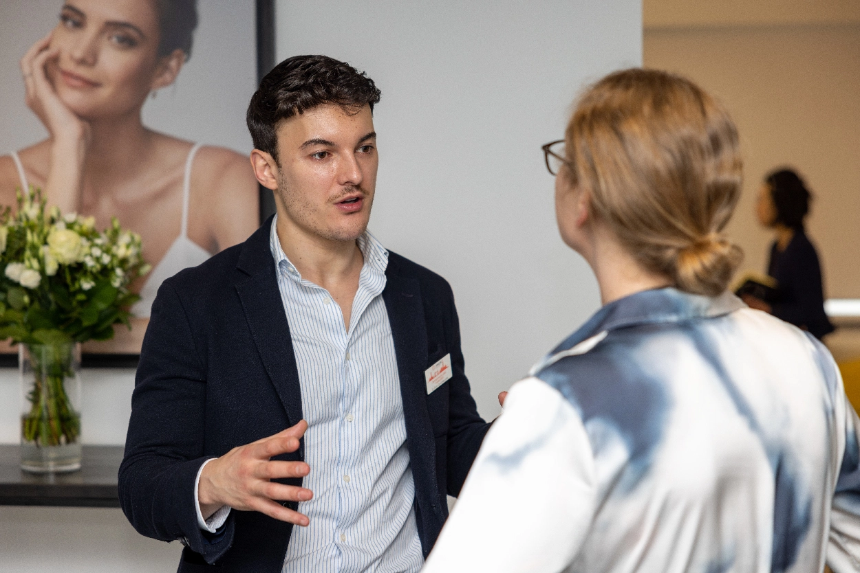 Networking at a Cynosure trade show, filmed by an event videographer from Medialook