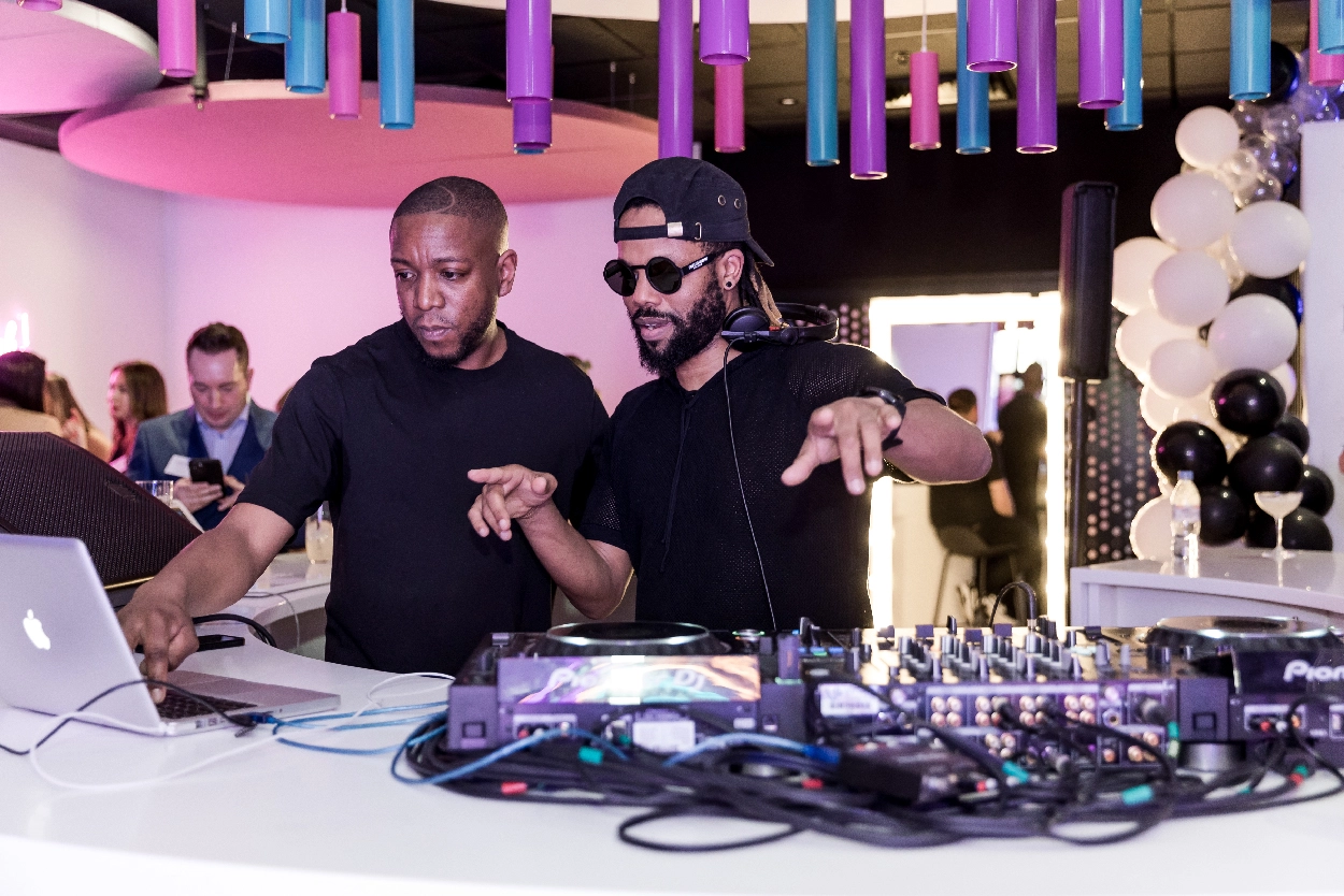 A DJ performing at a HydraFacial corporate event, captured by an event videographer from Medialook