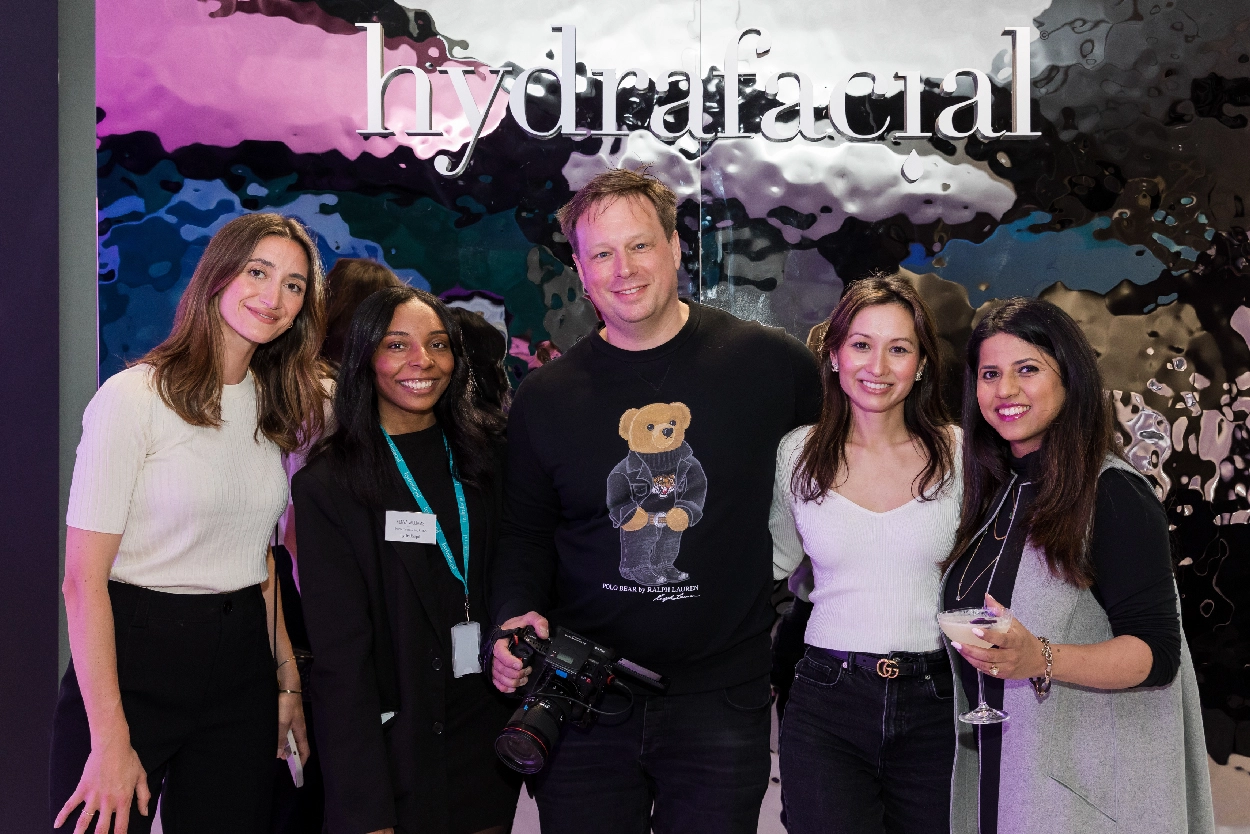 The HydraFacial team with their videographer from Medialook at a corporate event