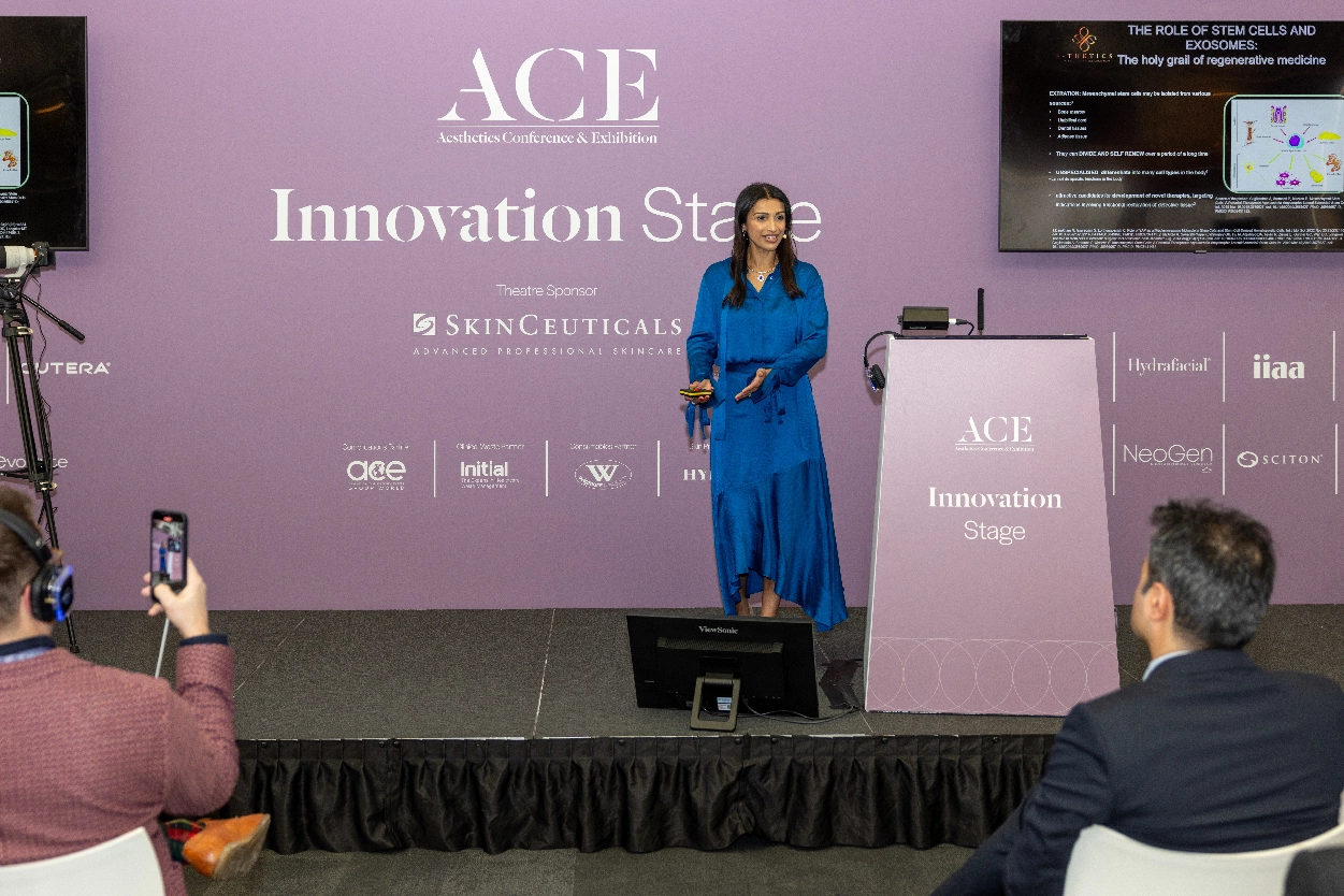 Miss Sherina presenting at a conference, captured by an event videographer from Medialook