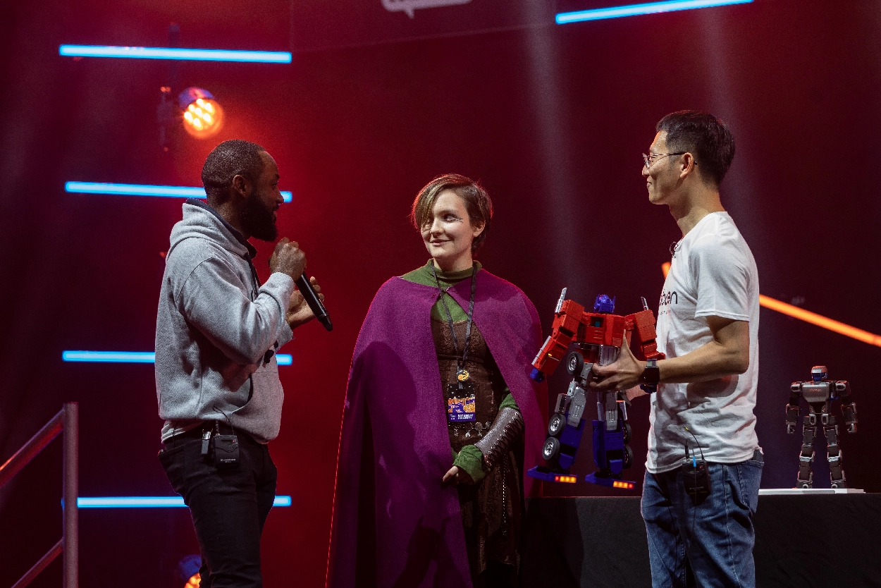 An on-stage interview at a Robosen event, filmed by an event videographer from Medialook