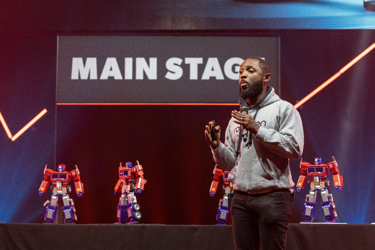 A keynote speaker on stage at a Robosen event, captured by an event videographer from Medialook